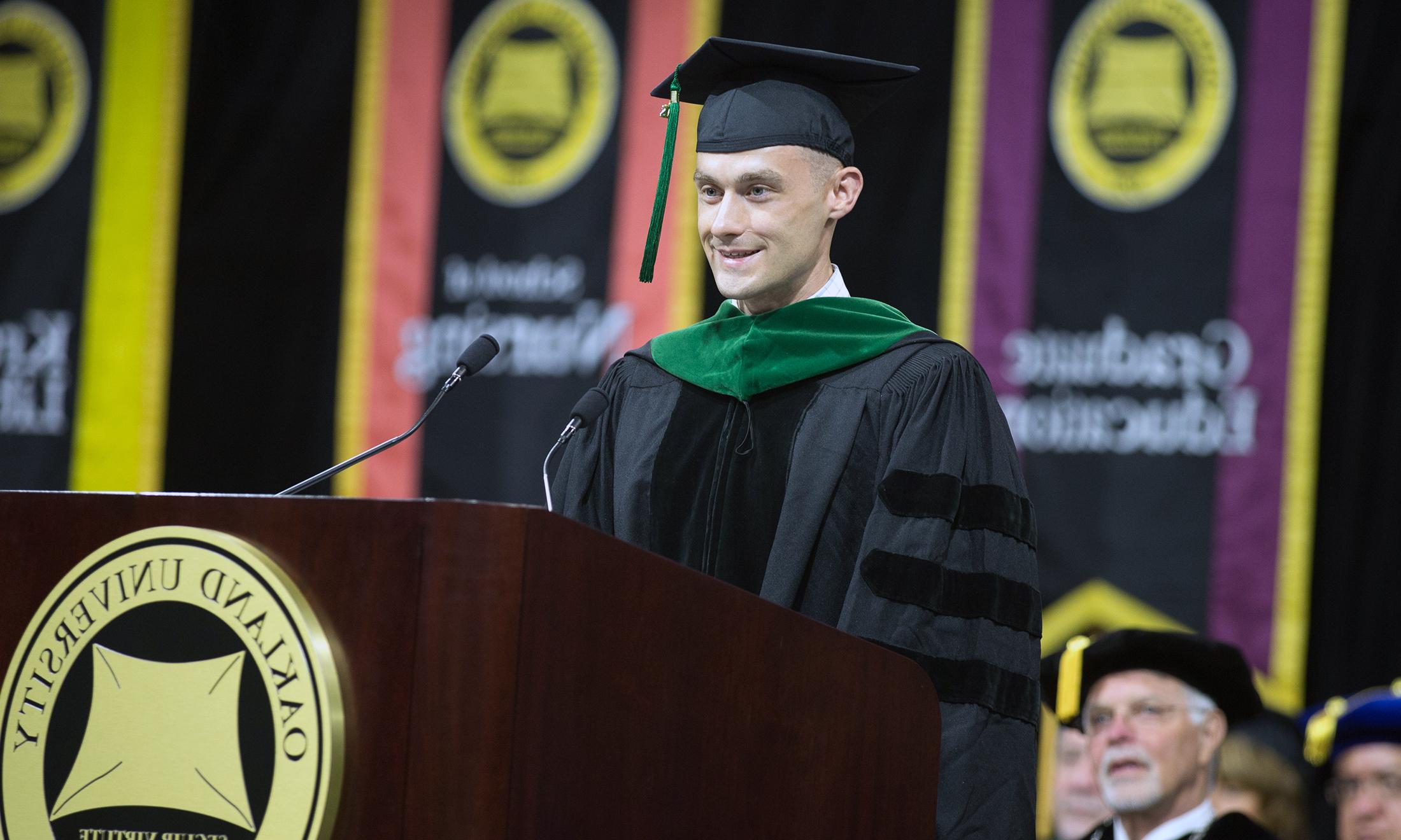 An image of Woody Sams speaking at commencement