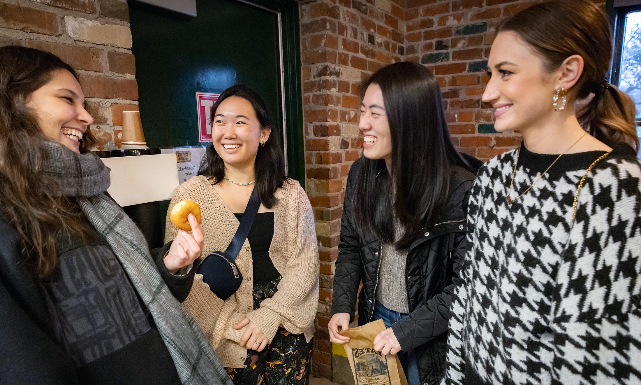 An image of students gathered at a social event for OUWB's Big Sib Little Sib program