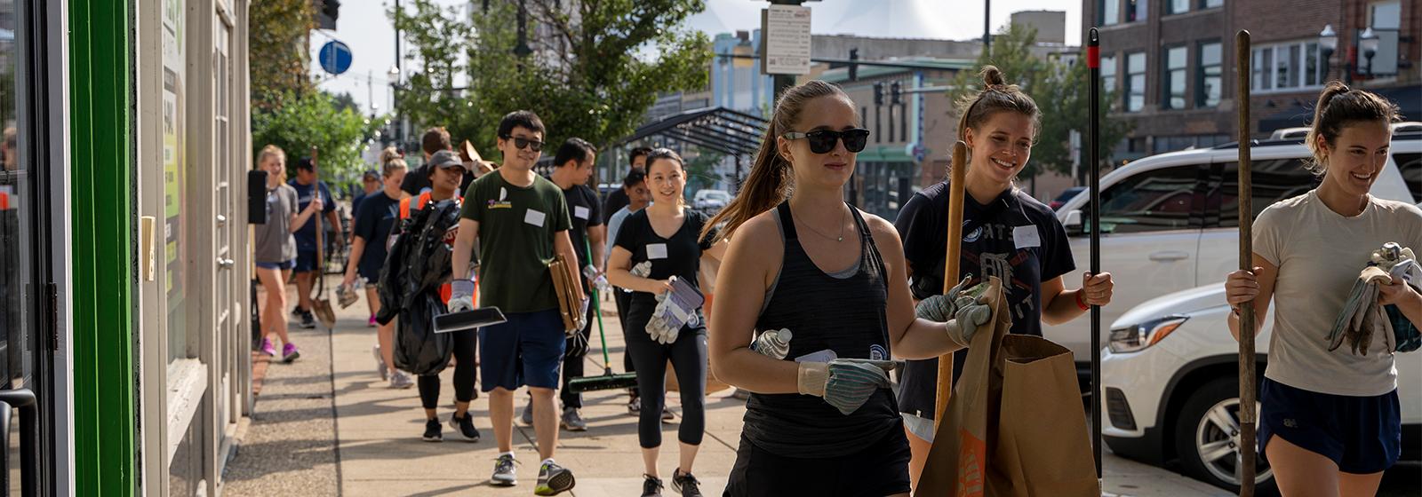 An image of OUWB students cleaning up Pontiac